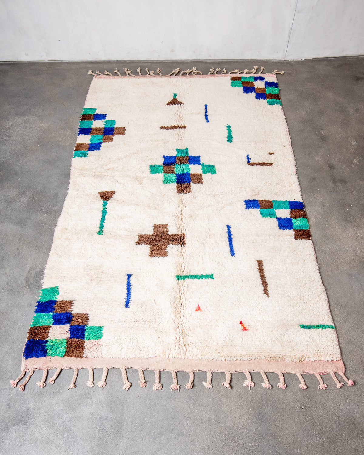 Modern, designer, handcrafted Berber rug from Morocco. Vintage carpet with beautiful colours and patterns and fluffy texture.